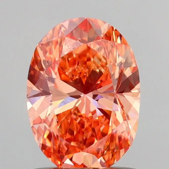 1.04ct Oval Lab Grown Diamond (Colour Fancy Vivid Pinkish Orange, Clarity VS1, IGI Certified)