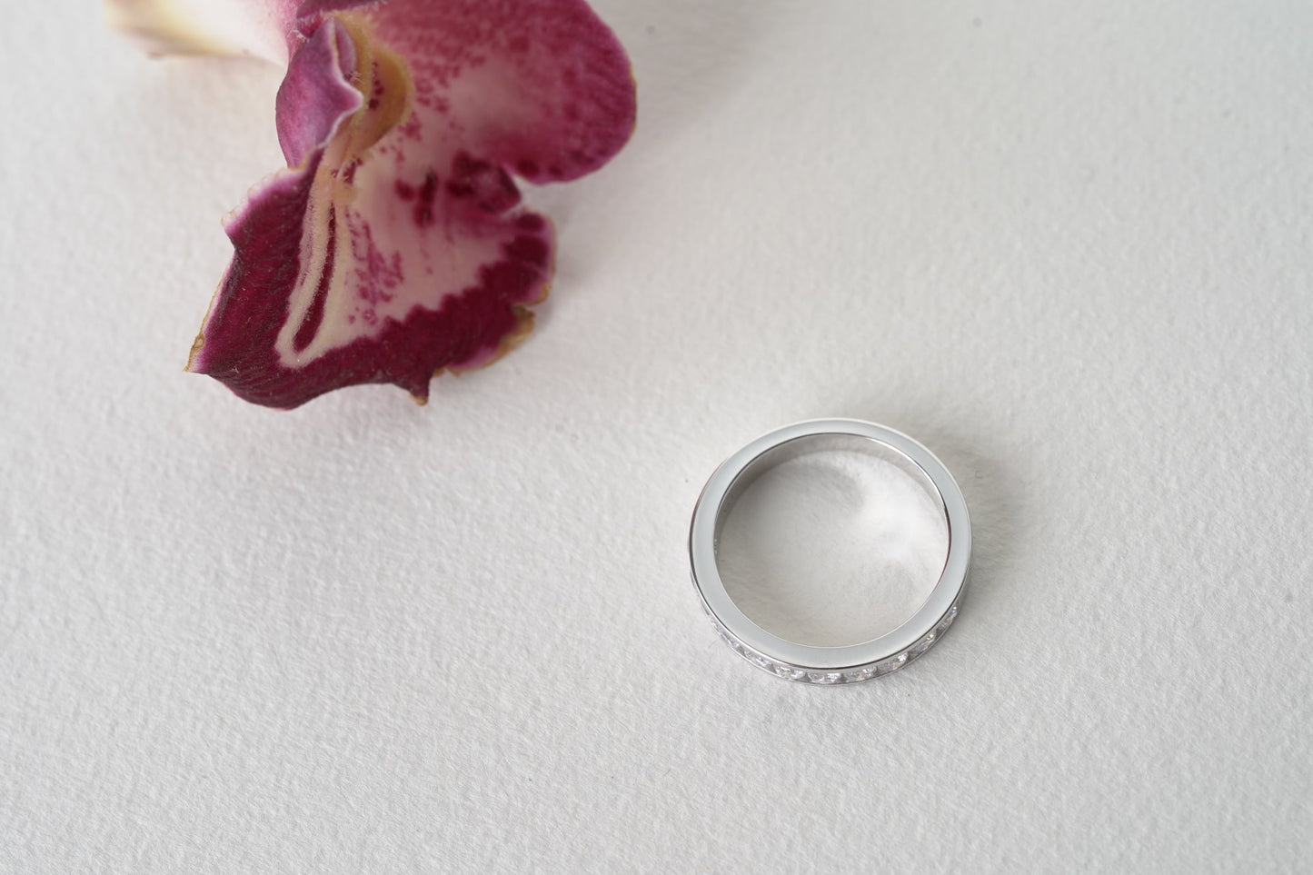 BOLERO | CHANNEL SET HALF PAVÉ WEDDING BAND