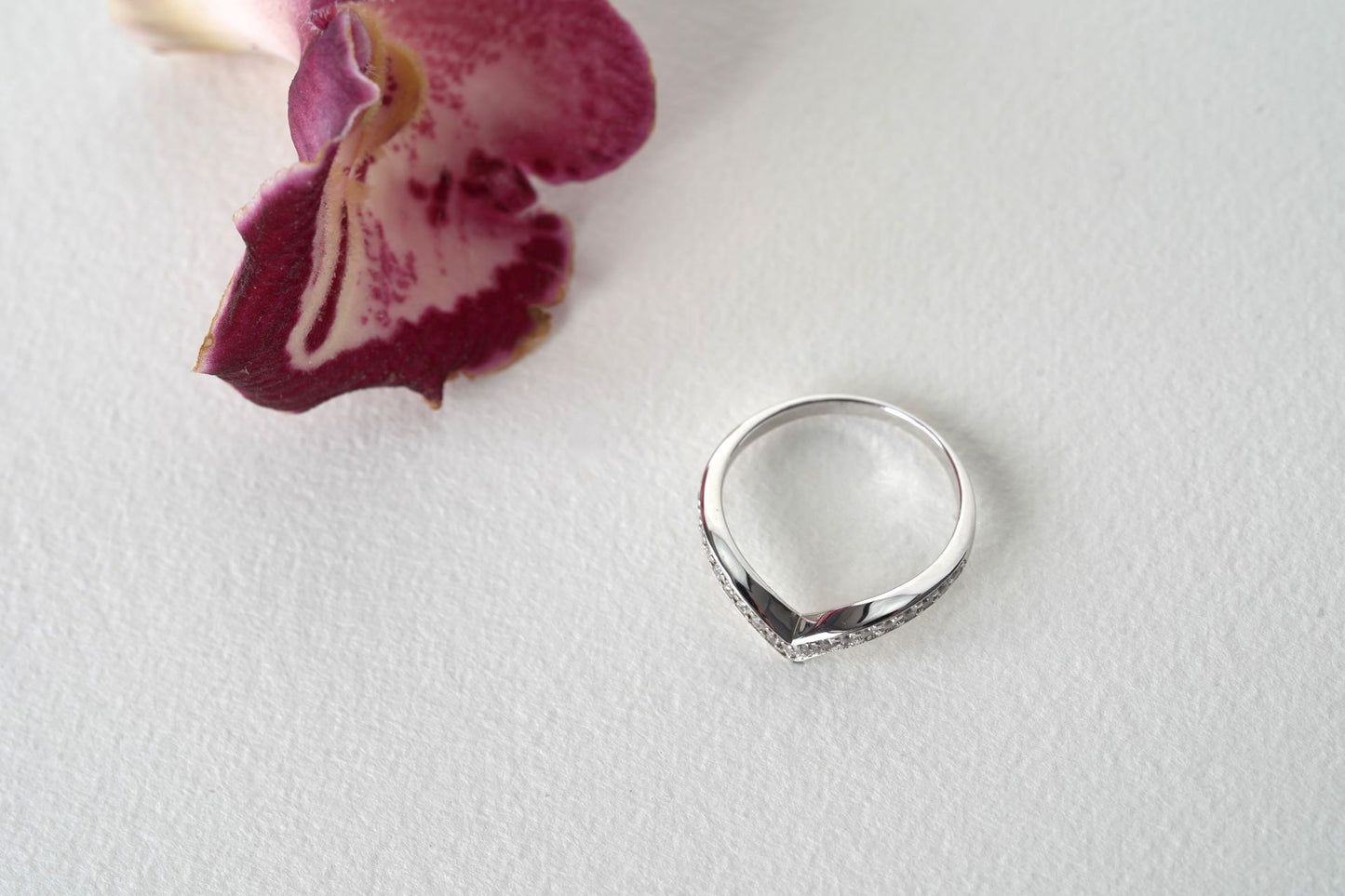 NIMBUS II | HALF PAVÉ CURVED CHANNEL WEDDING BAND